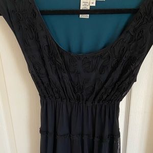 Black dress with tiered above knee skirt